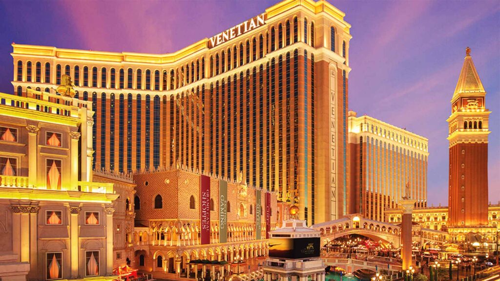 The Venetian Resort illuminated at dusk — a prime example of luxury hotels in Las Vegas known for grand architecture and upscale experiences.