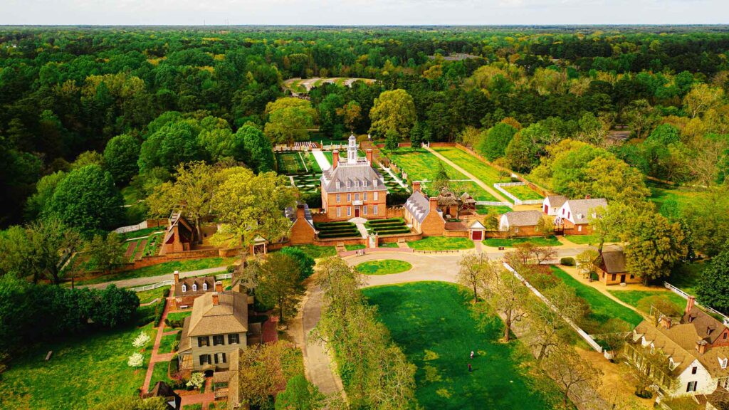 Aerial view of Colonial Williamsburg, a top destination for affordable family vacations filled with history and charm in Virginia.