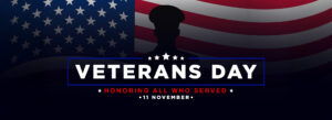 A silhouette of a soldier against the American flag, symbolizing Veterans Day and honoring those who served in the military.