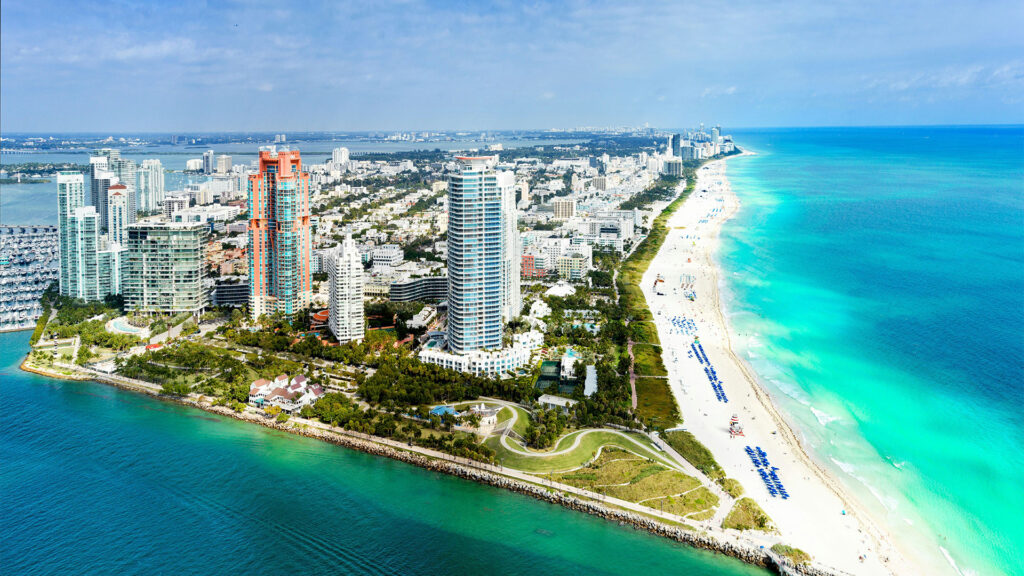 A view of Miami Beach's skyline, offering a perfect beach escape for February 2026 travel with clear waters and beautiful weather.