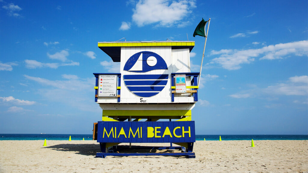 Vibrant lifeguard station in Miami Beach, Florida, offering a quintessential February beach experience.