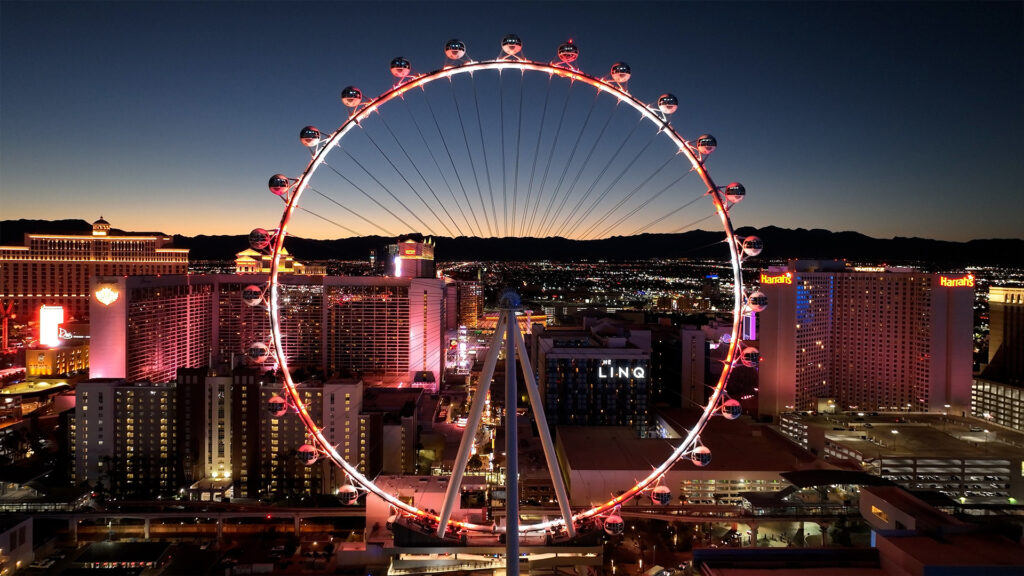 The Ferris wheel at the Linq in Las Vegas, with a view of the city skyline.