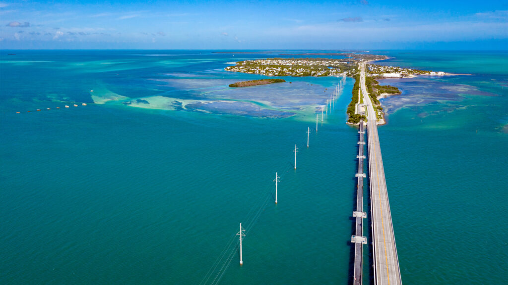 Aerial view of the Overseas Highway connecting islands to Key West, Florida, perfect for a February vacation road trip.