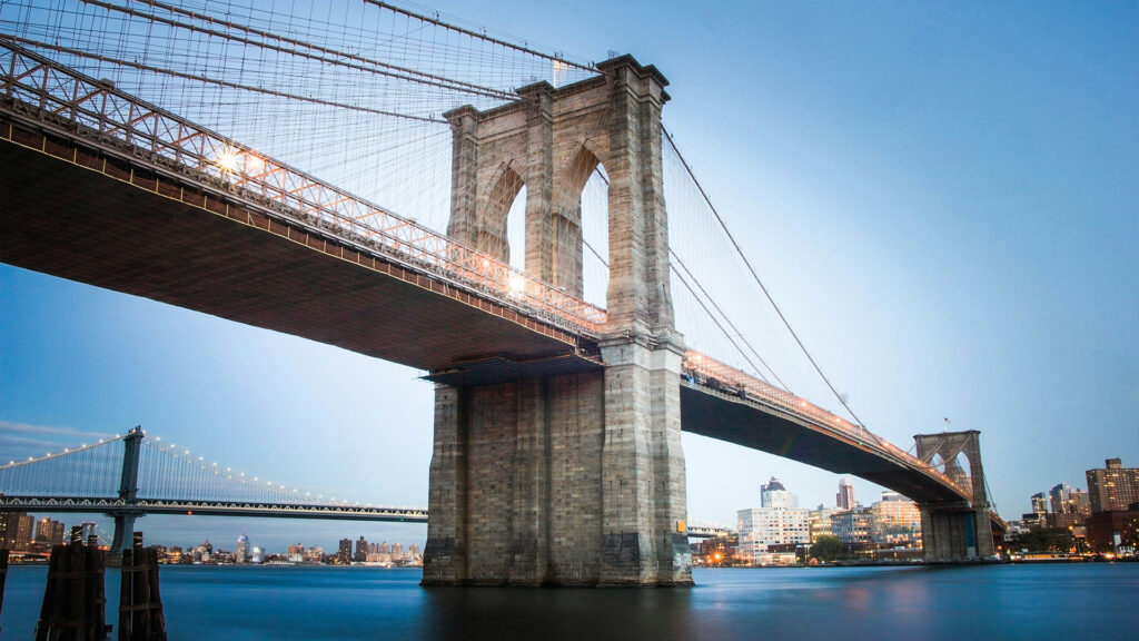 Brooklyn Bridge spanning the East River with New York City skyline