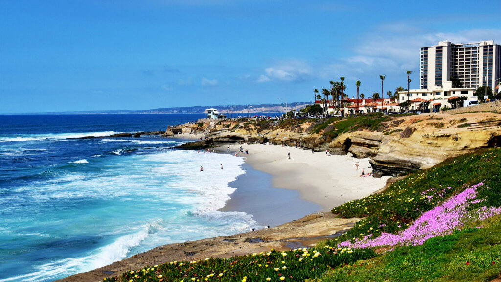 Spring Break Getaways featuring San Diego Beach, a sunny coastal beach city with ocean waves and cliffs