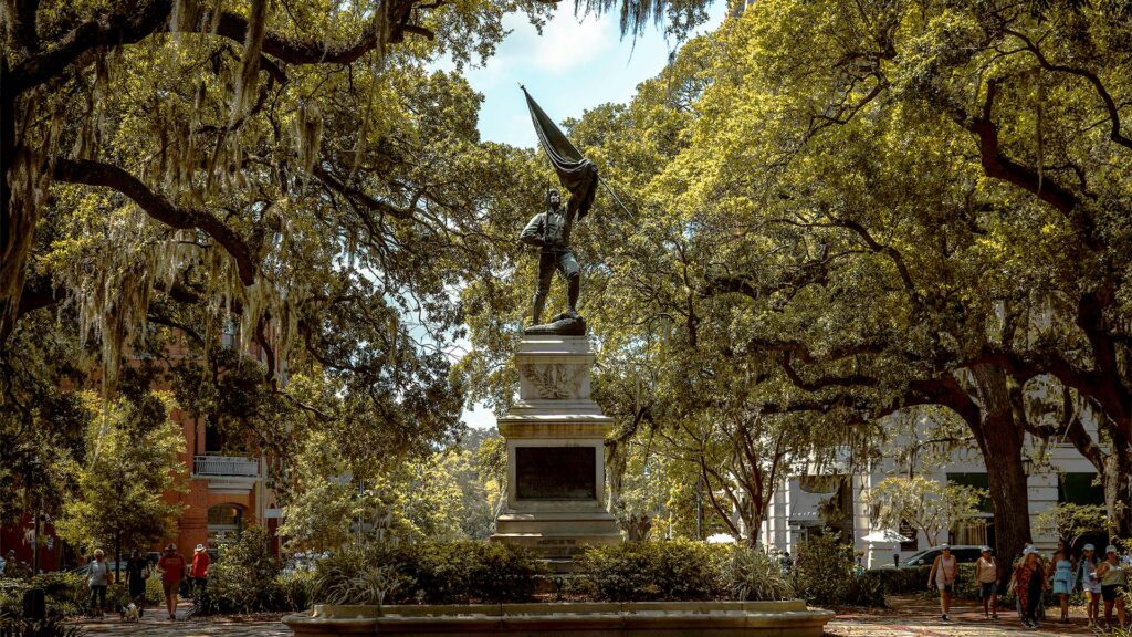 Historic fountain surrounded by oak trees in Savannah’s Forsyth Park, located in one of the best coastal cities in America