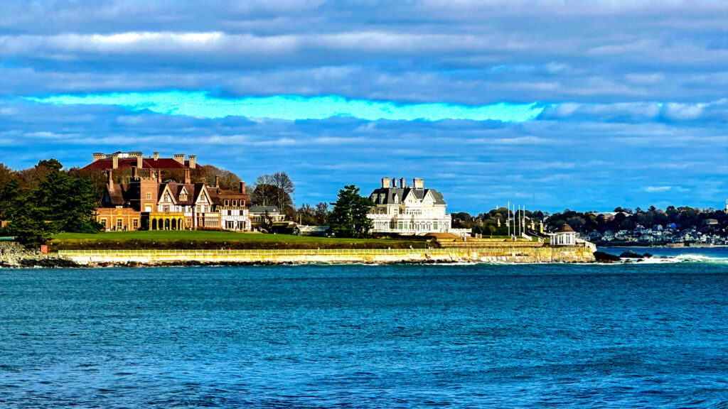 Elegant seaside mansions overlooking the ocean in Newport, a classic destination among the best coastal cities in America